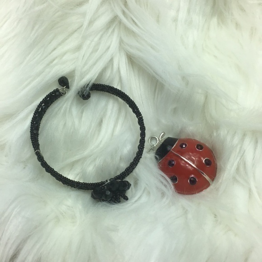 Bangle bracelet with flower detail, NWT.